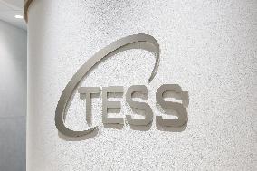 Tess Holdings Sign and Logo